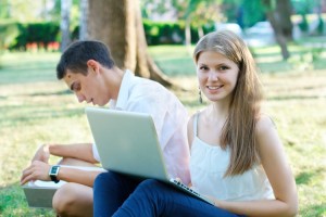 students-laptops-park